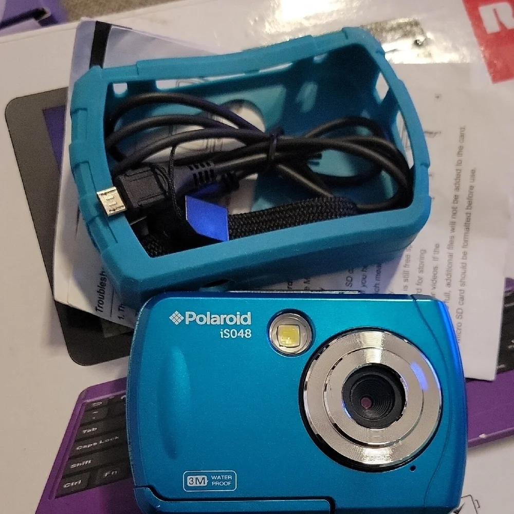 Polaroid iS048 Blue Digital Point-and-Shoot Camera with Blue Silicone Case